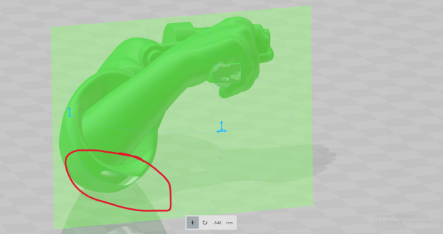In trying to cut off the lower part of the gun we have a problem, it cuts off too much of the sleeve. We'll need our trusty cube again.