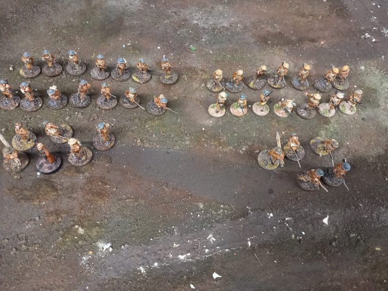 After picking up the 1918 rule book I thought I'd take a look at the force lists and what I can put together with the minis I already have. Starting either the British here is a rifle platoon that could be one with four units or two smaller platoons with commands