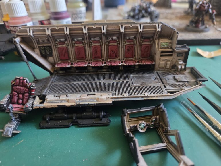 Some of the sub assemblies of the Lighter. Floor and side wall, pilot seat and cockpit canopy. I forgot to take a picture when I first started  but the interior had only been drybrushed up from a base of Khaki with an Agrax Earthshade wash up to a final skeleton bone highlight. Here I have painted all the details and highlighted, i have alo used some screen decals, fot the cockpit, and also on some of the monitors above the seats( zoom in to see more clearly).Though these will be barely visible from the exterior, if I look through back door I can still see them, and that makes me happy.