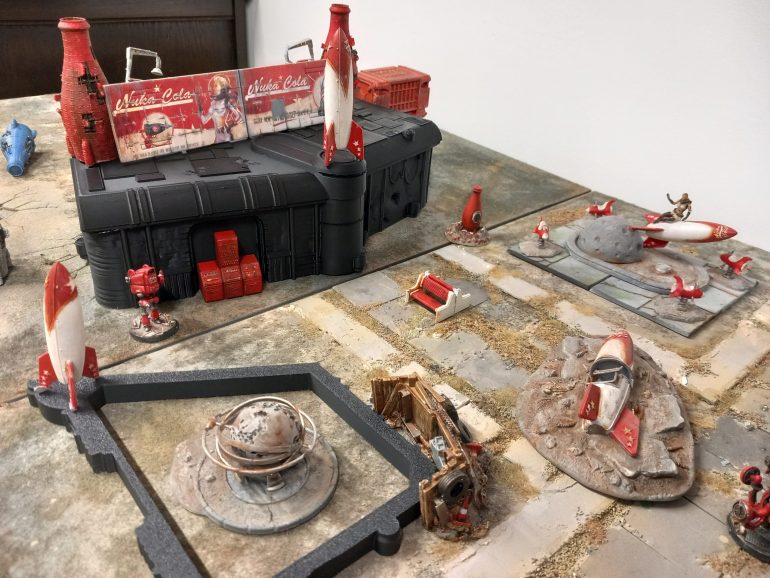 Messing around with the layout using some of the card advertising from the nukaworld starter set