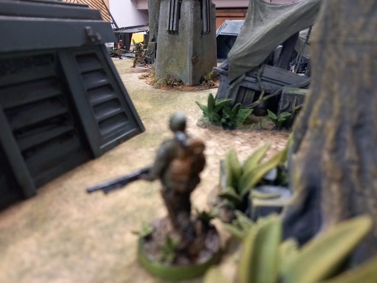 Krigs advance is spotted by a merc who blasts at the trandoshan and wounding him 