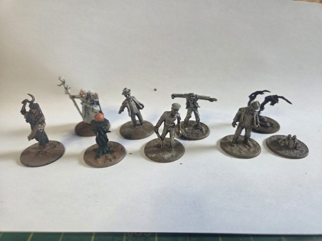 From L to R: a Crooked Dice witch, a Reaper witch, 3 Harwood Hobbies and 1 Copplestone zombie to represent Husks. As well as three tokens that can denote Minor Mythos locations.