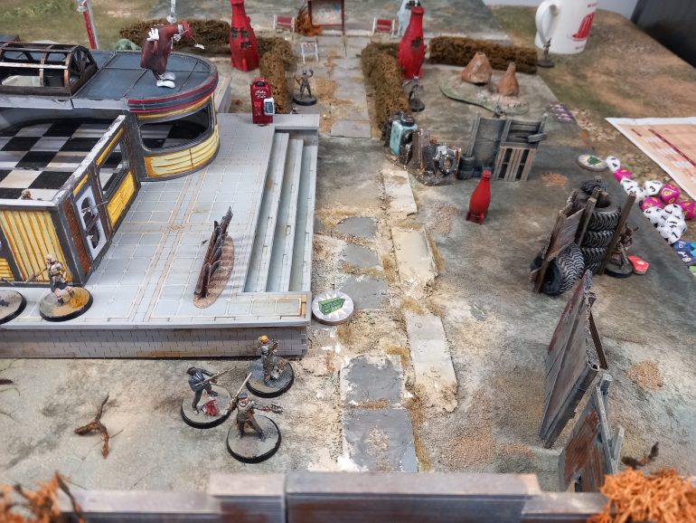 Our final skirmish also in the safari adventure saw a reduced pack trying to assault the operators who used the cover of a diner to win this one. I did well in these games and my opponent carried on using ploys to adress the imbalance once he started loosing men.