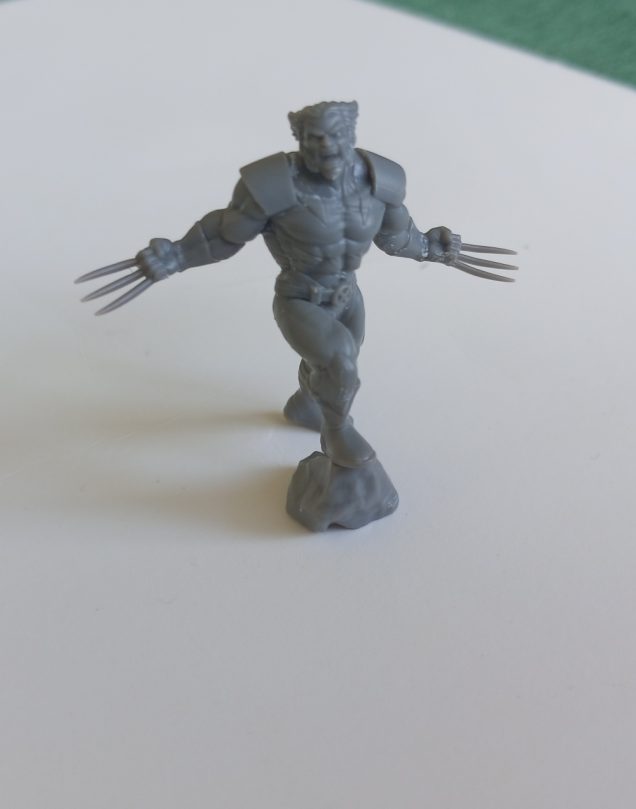 Wolverine. I have a lingering memory of him from the Days of Future Past comic book. A sentinel blasts him with some kind of energy and all that remains is his adamantium skeleton...