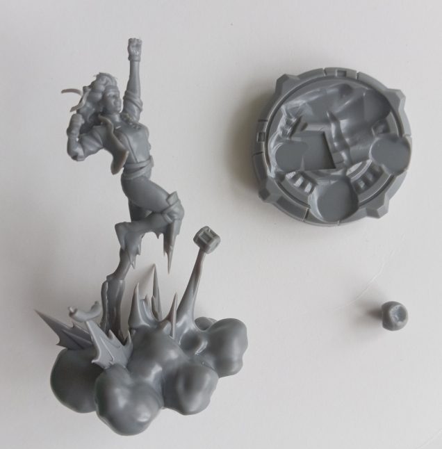 Tricky assembly again. Joining torso to legs was fiddly. I'll keep the 'clouds of dust' separate from the round base to make the painting easier. The little blob bottom right is supposed to be on her fist, but I prefer her with her left hand free.