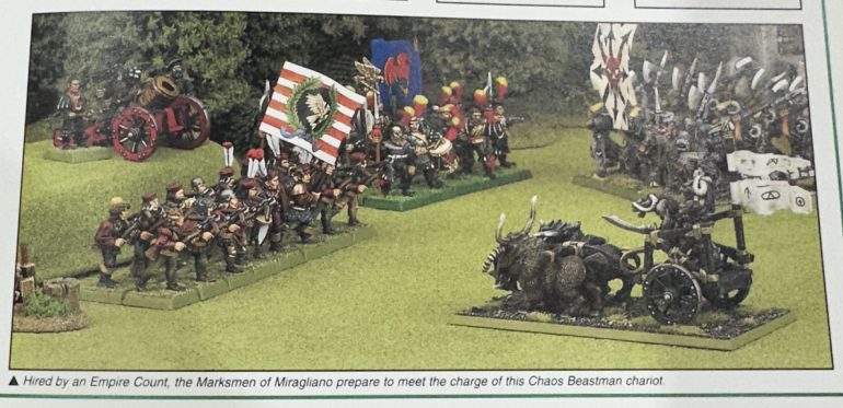 You can see the two different basing styles here.  Green painted basing sand on the left and the spring green grass flock over brown painted basing sand on the right.  Goblin Green base edges are standard.