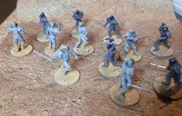 The completed starter set, all the models were painted, basing and pigments applied, a rust and an ochre, matt varnished, then I applied three coats of gloss varnish to the visors, and painted the metallic to keep their sheen.