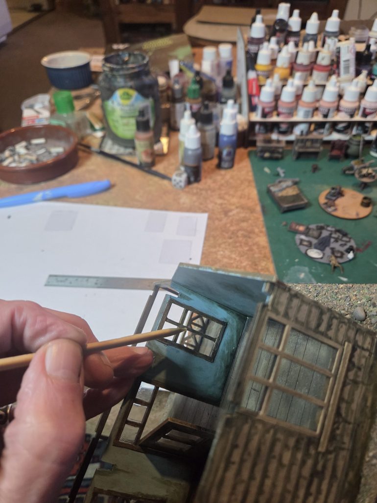 To affix the windows i used Gorrilla clear glue carefully applied with a wooden skewers. 