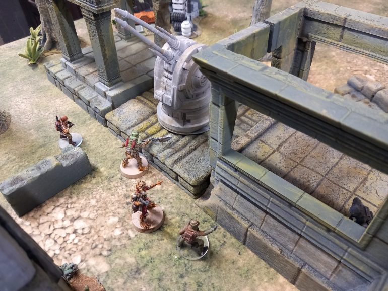 The crew make a dash for the gun whil Bogun gives covering fire with his rattle gun.