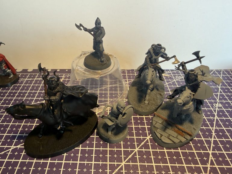 The unpainted models wearing Mail