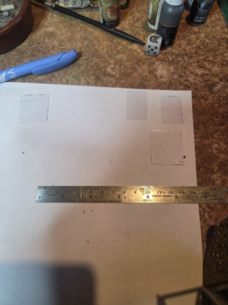 I wanted to add some glazing in the windows, so I used A4 clear plastic book covers ( sold to be used with booklets ring binders), which I measured and cut to size.