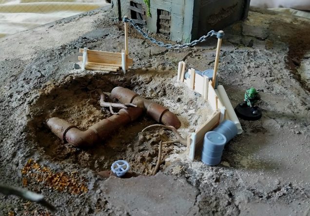 More sticks and a knock off lego chain. Some sand and rocks added. Will blend them in with paint and moss flock.