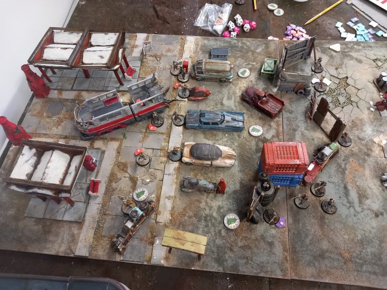 Continuing the campaign we rolled up another scenario in the wasteland. Seeking revenge the pack ambush my operators but I was lucky with my roles so all my gang were on the table and got to shoot before the pack could move. To win I realised I had to survive so I stayed as far away from the pack as possible. This worked and the pack lost men sprinting across the table