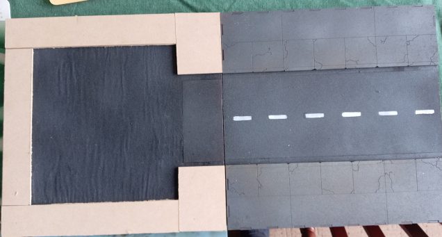 I really should try to find a Marvin the Paranoid Android to go here as he does love to park cars.