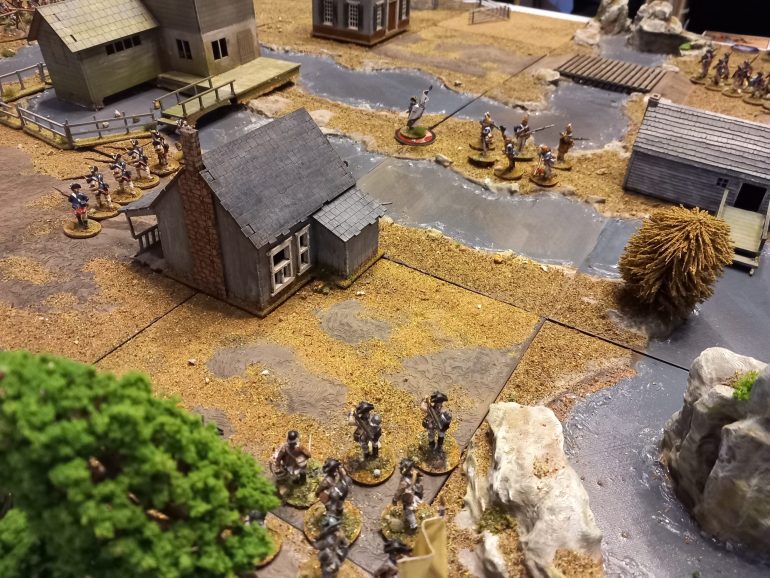 The brits and Germans deployed across the middle of hhe table while the Americans moved in from 4 different areas. They found it difficult to get close to their objectives. A well placed cannon shot from the hill had continentals running as they tried to cross a bridge and were kept at bay by musket fire.