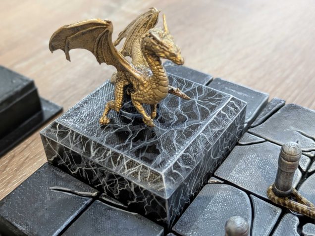 A lick of gold paint - I used Vallejo Tinny Tin, dry brushed with Glorious Gold, then Polished Gold