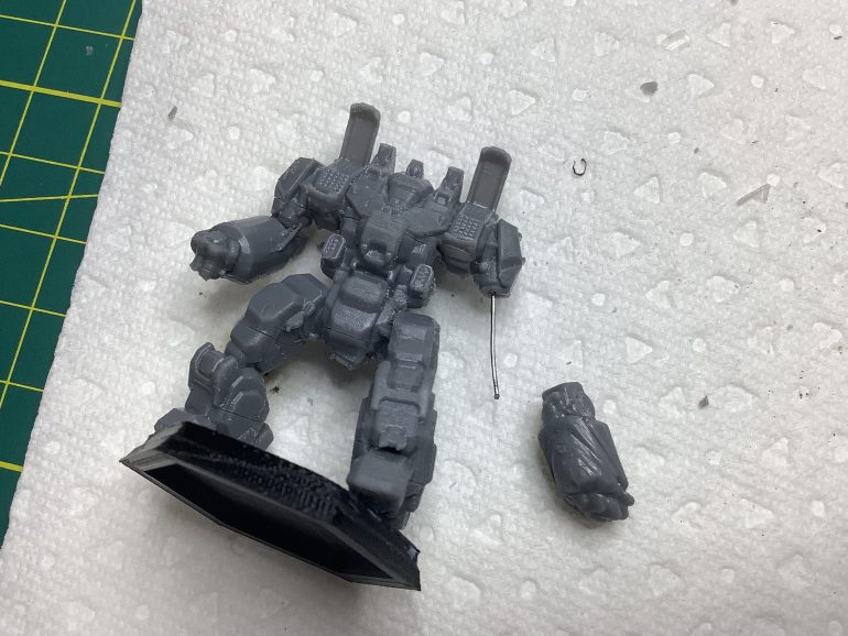 Superglueing the arm.
