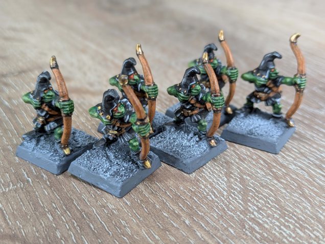 I also had 6 of the original monopose night goblin archers. Again I decided not to go for the bright yellow stripes and details of the original set, choosing instead to stick to black, grey and brown so they fitted in with the other Orcs and Goblins