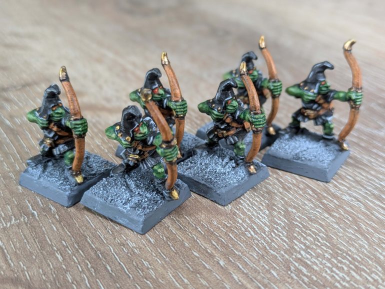 I also had 6 of the original monopose night goblin archers. Again I decided not to go for the bright yellow stripes and details of the original set, choosing instead to stick to black, grey and brown so they fitted in with the other Orcs and Goblins