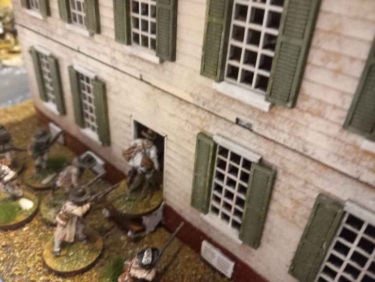 Rifleman storm a building only to get shot up by brunswick fusiliers. They fallback outside and the germans take positions at the windows. Meanwhile the Dragoons splash across the stream and see off the militia