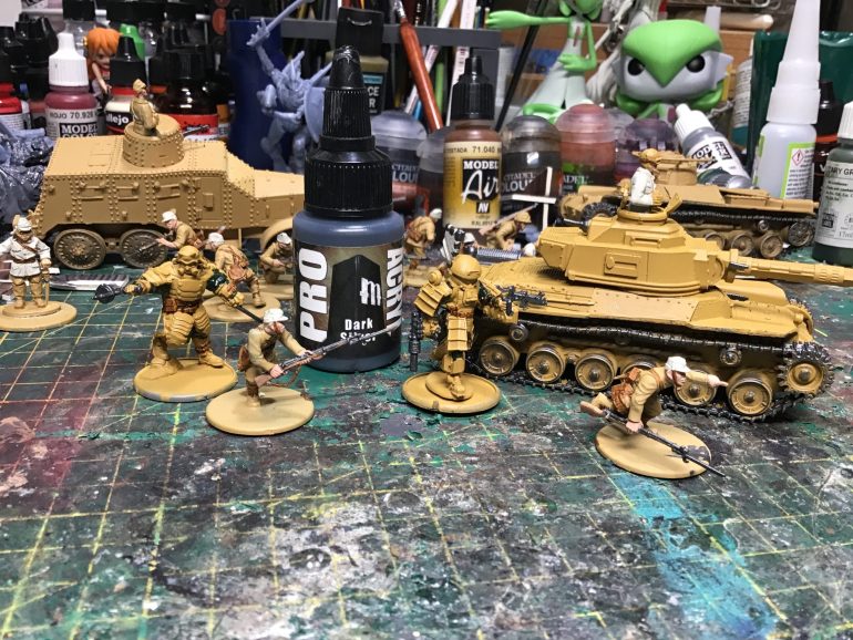 Painted all the model metallic parts of the gun with pro acrylic dark silver. This step made the soldier model look ready for table
