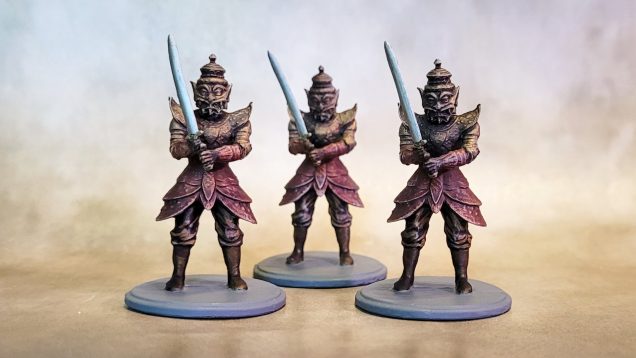 The armored guards were drybrushed gold over black primer, then I went in and did the red bits with speedpaint, followed by another light drybrush in gold, then some final highlights in Ancient Stone.
