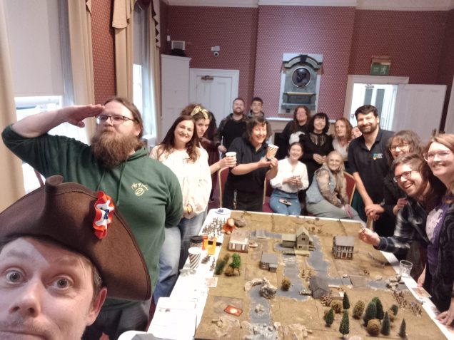 Finally had the birthday game. It took over an hour to get folk to pay attention but once it got going everyone had fun. Everyone had a unit to control and the card driven system of muskets and tomahawks kept everyone on their toes. The colonial forces were trying to gain control of the hamlet  from the British 
