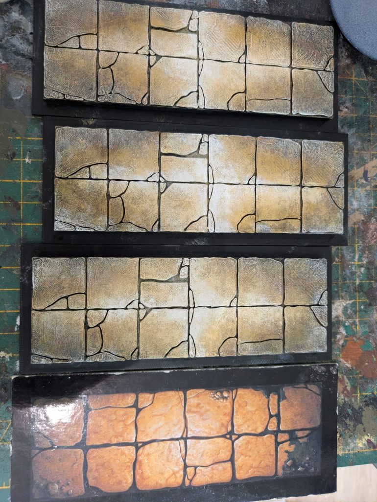 I used artists acrylics for base coats and some dry brushing, then a few Citadel inks for shading. I picked out highlights with Vallejo model colour paints