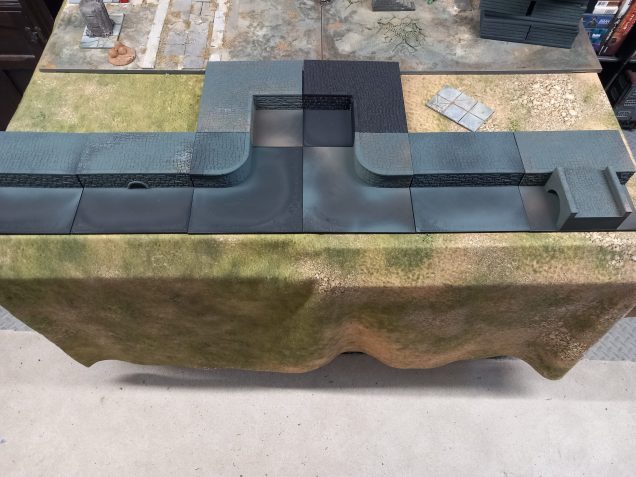I found some harbour sections on mymini factory which I'll be using for other projects but work for the river of cola 