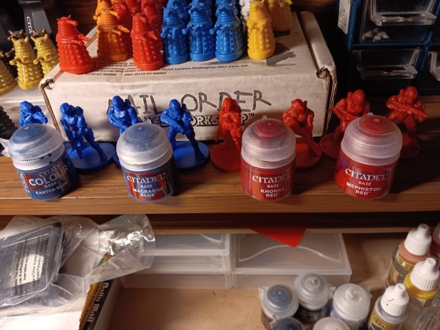 Minis with the paints, dark first, light second.