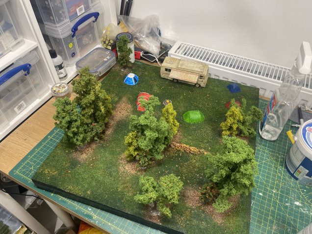 board when trees stuck down with superglue and the rim painted black