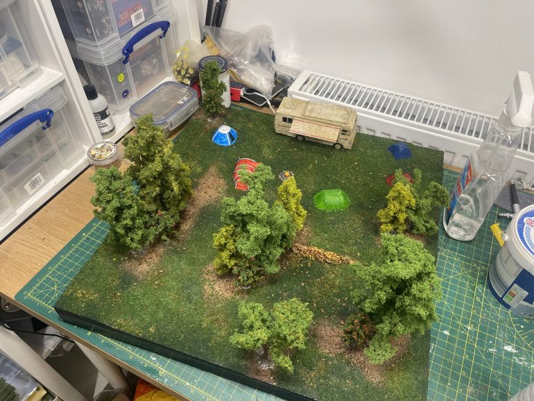 board when trees stuck down with superglue and the rim painted black