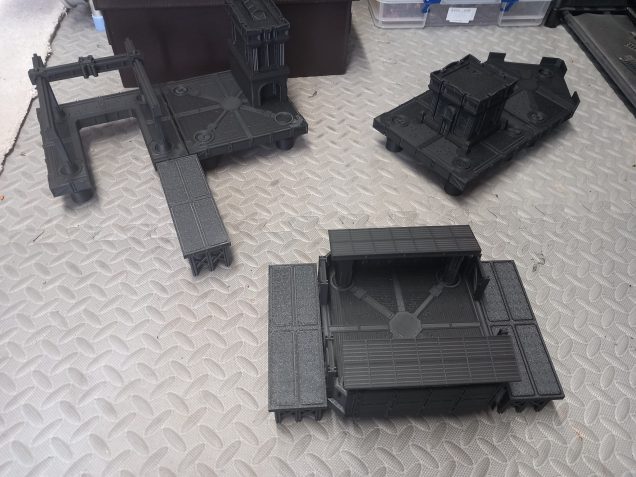 I've spent the last couple of weeks printing out everything needed for the starter campaign. The docks are a great modular kit that can be rearranged for each scenario. They do warn you not to glue anything together.
