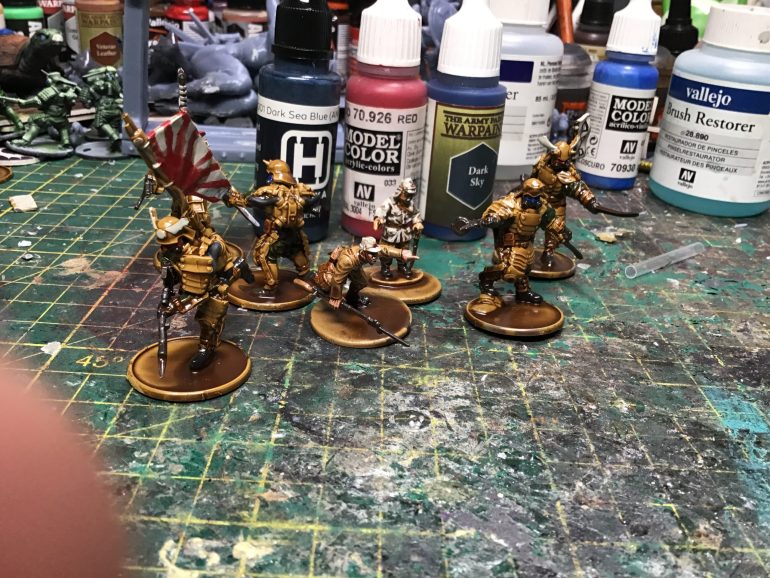 Use the same red on marker on the leader types. Use dark sea blue on cable on heavy armour guys dark sky on mask on normal armour guy