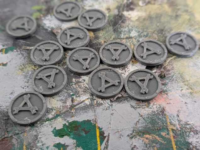 I had a few sprues from a WHFB 5th Ed Skaven Clanrat boxed set, with multi-pose minis rather than the monopose skaven that came with the original WHQ. Unfortunately I didn't have the shields for these, so I went to my design program again and drew up some simple shields so all my Skaven would match.  
