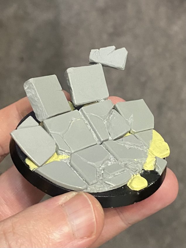 By cutting up an existing resin base I was able to add a sense of movement by repositioning tiles