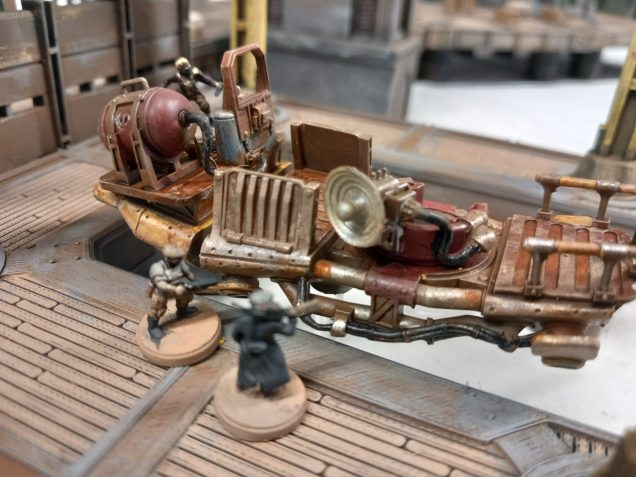 Yhe captain and surviving crew climb aboard and after a mechanical roll get the vehicle started. They make their escape but now need to find their impounded tug boat