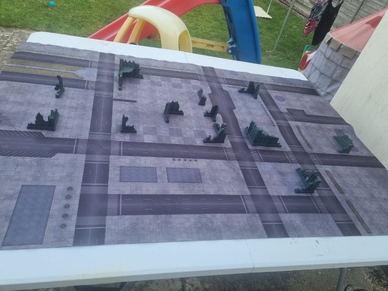 The battlefield - I ended up printing a few more pieces of terrain to fill the board