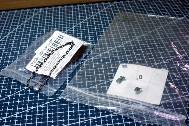 A new metal chain to replace the broken printed one.