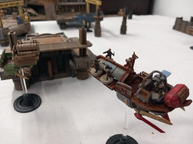 A pirate boat heads towards the docks but the company won't turn hostile unless we get too close