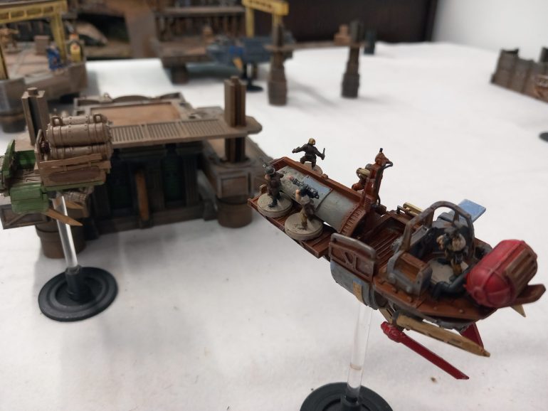 A pirate boat heads towards the docks but the company won't turn hostile unless we get too close