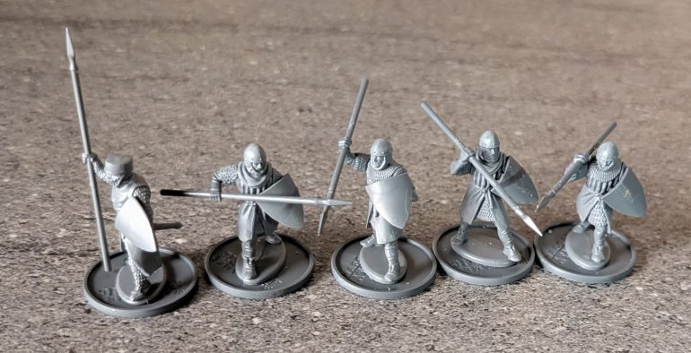 Pointy sticks, but as these fellas are better than the peasants, they get a shield as well
