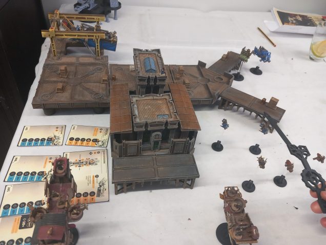 Company and pirate bikes clash as the larger vehicles move in. A gunner users his gocket launcher to blow a hole in the harbour masters door