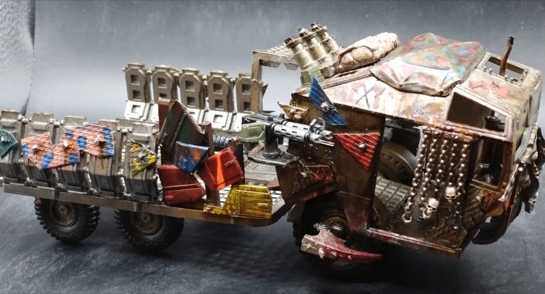 There's a rule for spiky wheels that gives the trukk a melee bonus, so painted the claws (from a chaos wardog hand) nice and bloody to stress the point.