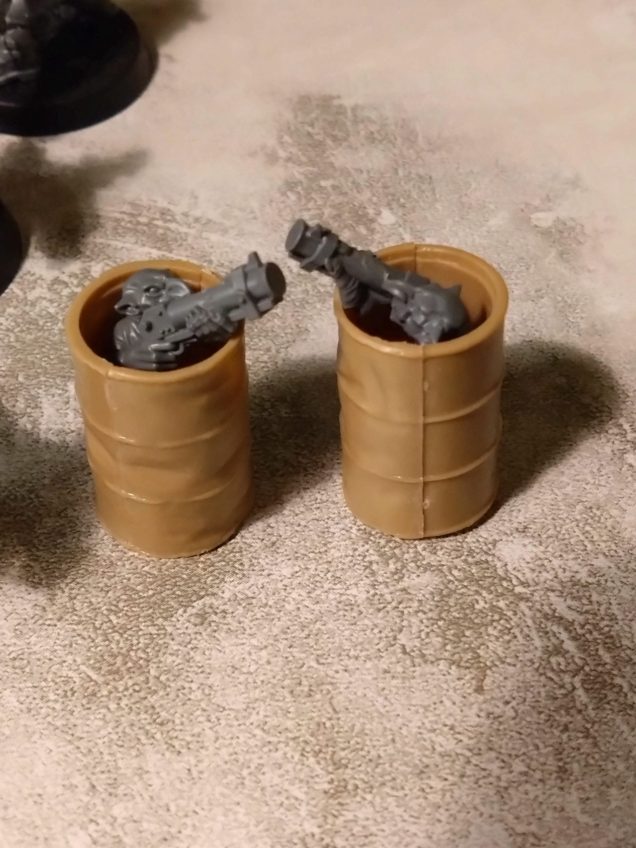 I built a load of Gretchen from the biggest sprue. It turns out that there are spare torso options that have no bodies. I didn't want to lose these parts as potential models so with a fun conversion peaking out of barrels these will figure in my force.