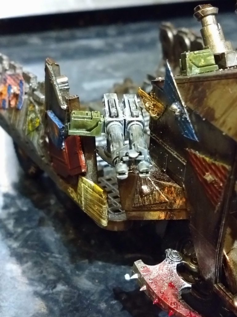Went with a shiny makeshift gun to help me remember to shoot with it, to make it standout from the weathered metal around it.