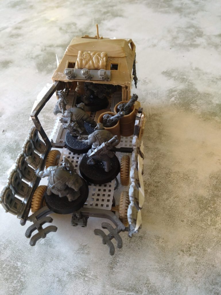 I think the number of minis that can fit in the Trukk doesn't matter but I can get quite a few in there.