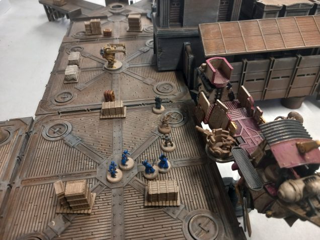 Docking the tug the crew skirmish with company officers while stealing loot