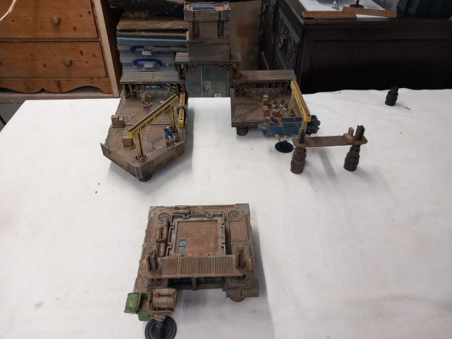 Down in the under docks a company patrol boat guards a gateway where traffic passers through. Our pirates have learned of a company convoy heading this way. They have some time to spring the ambush in this much more involved scenario which contains scheduled events and options for our crews