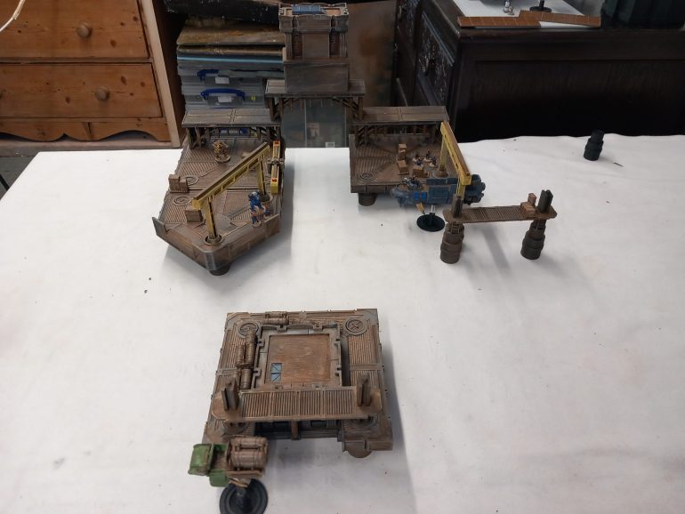 Down in the under docks a company patrol boat guards a gateway where traffic passers through. Our pirates have learned of a company convoy heading this way. They have some time to spring the ambush in this much more involved scenario which contains scheduled events and options for our crews